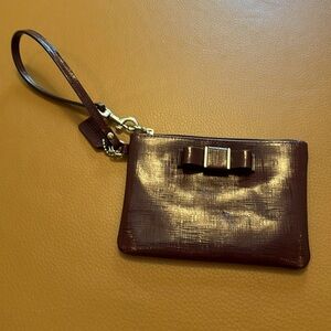 Maroon leather coach wristlet
